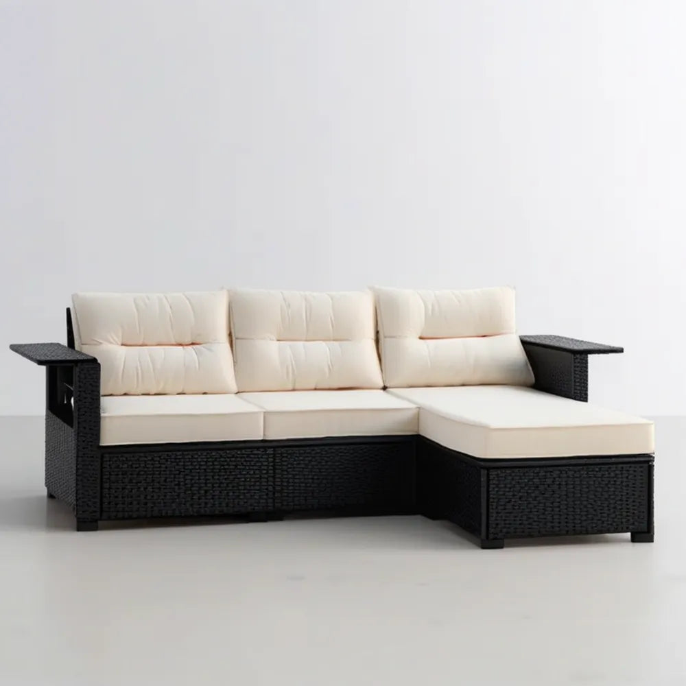 Prawostronna narożna sofa ogrodowa z technorattanu czarna z kremowymi poduszkami 210 x 140 x 63 cm